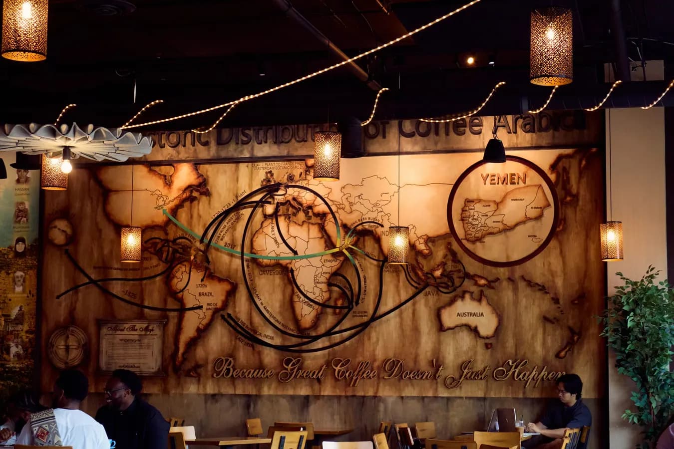 Coffee shop interior with a carved world map wall